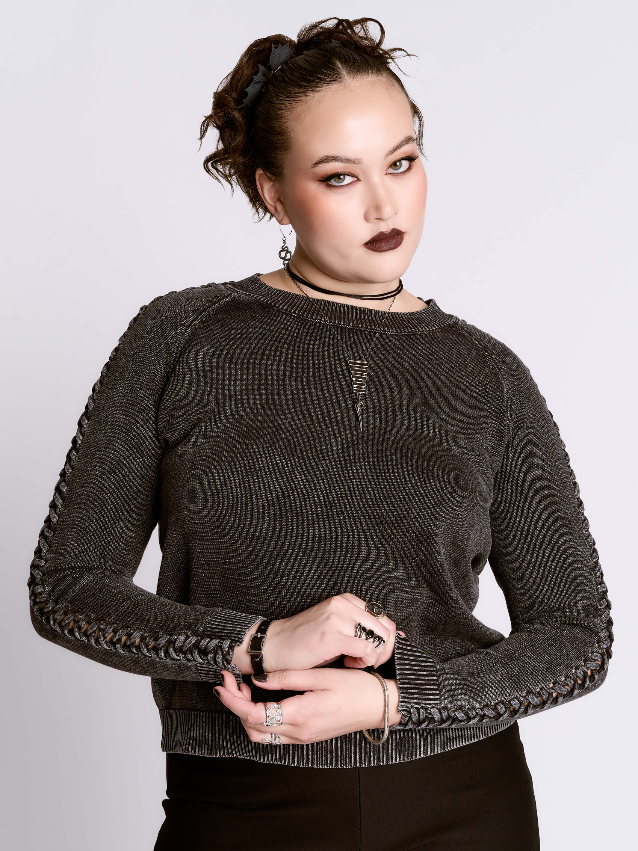 distressed braided sweater