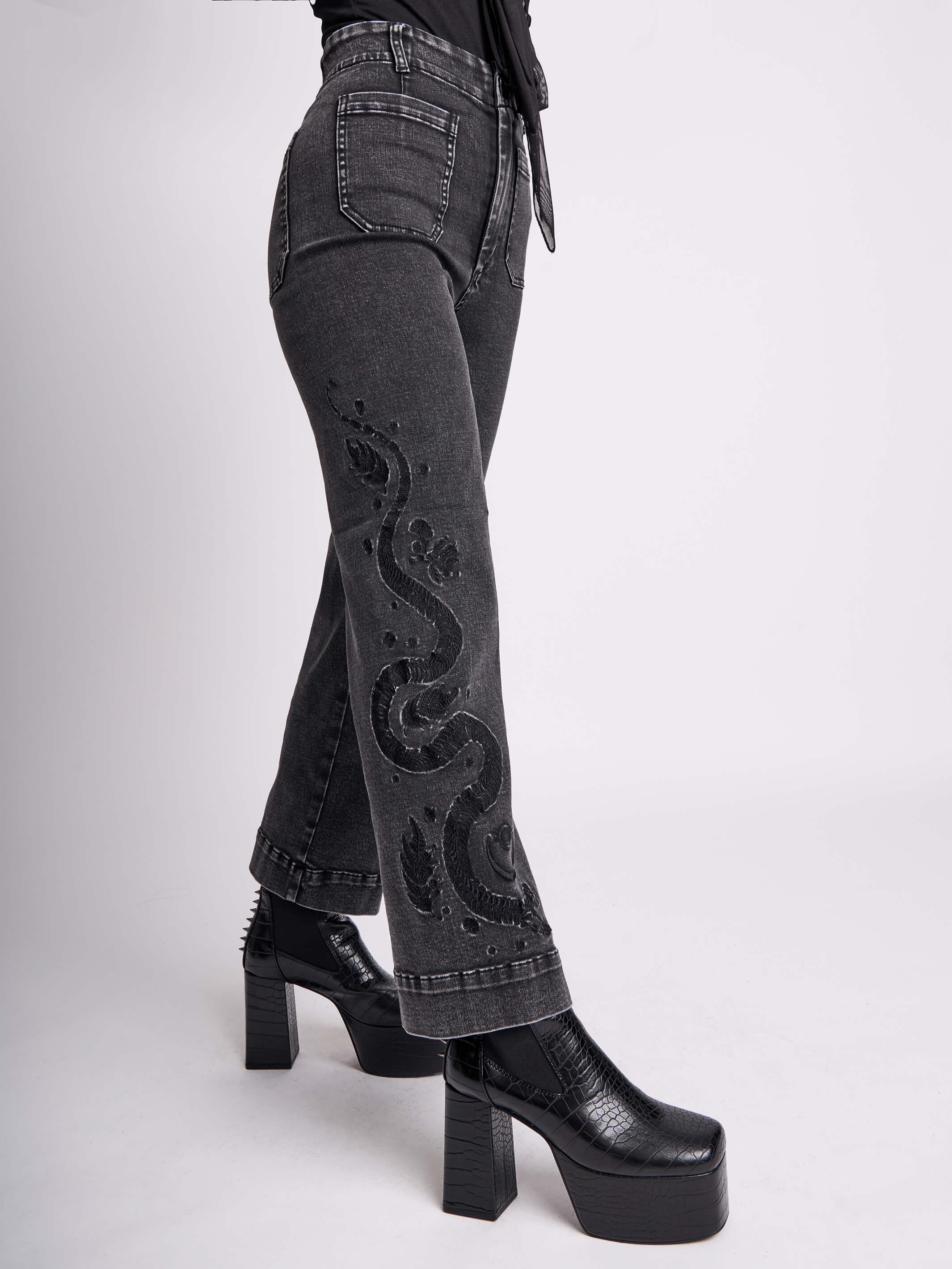 EMBROIDERED DISTRESSED DENIM