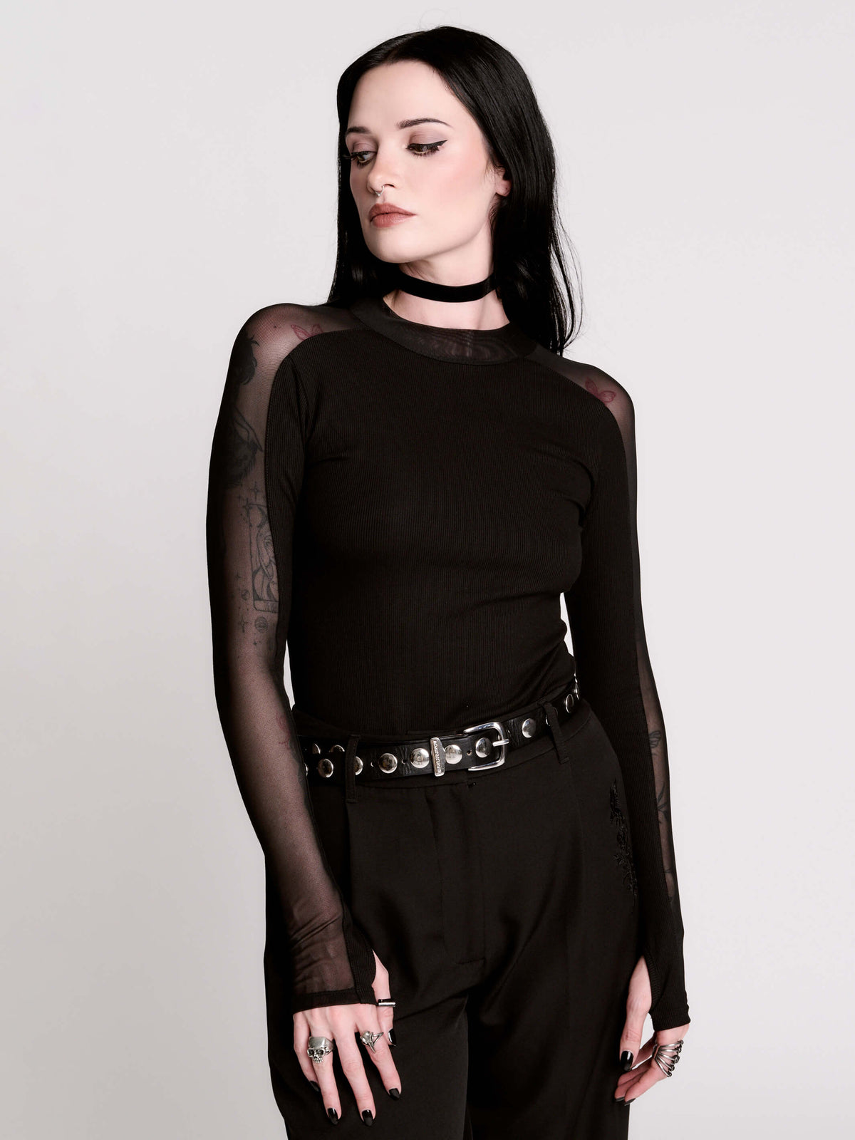 black long-sleeve top with sheer mesh sleeves