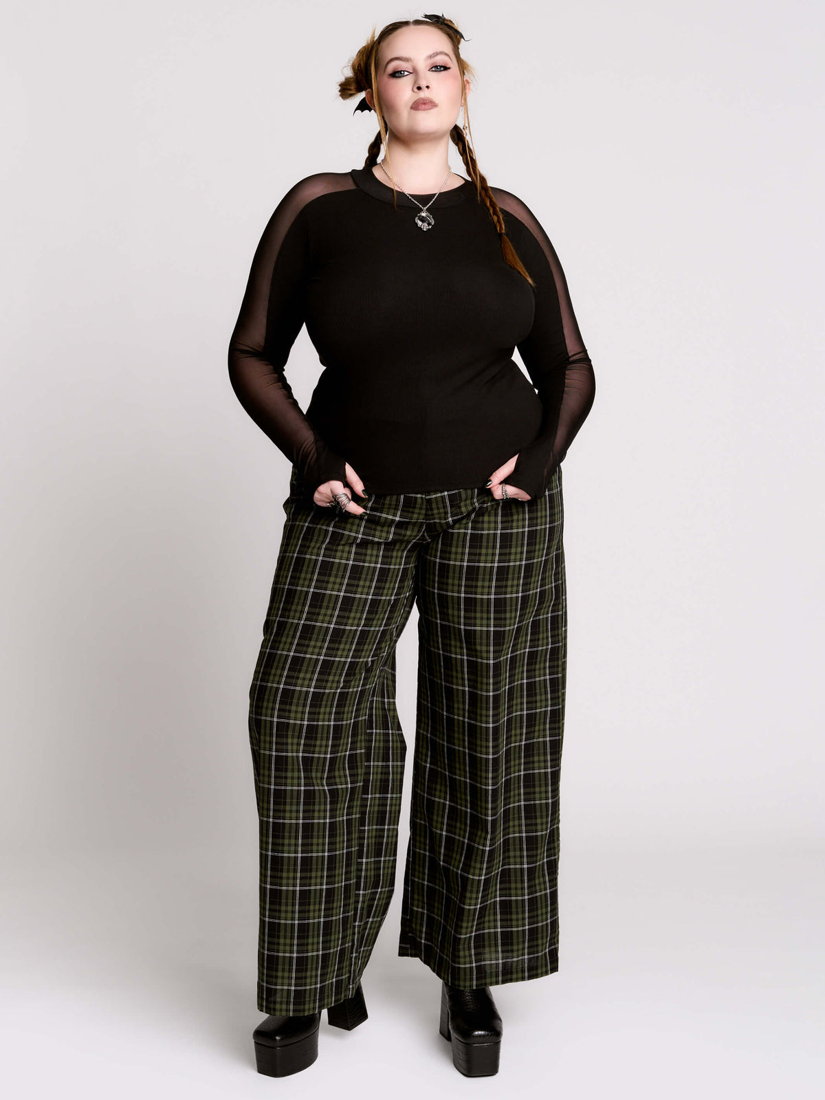 black long-sleeve top with sheer mesh sleeves