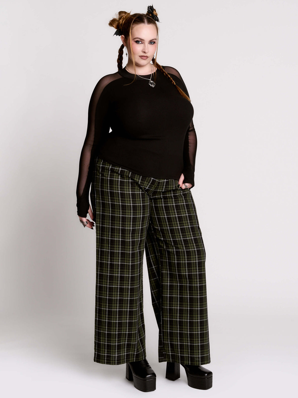 black long-sleeve top with sheer mesh sleeves