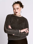 distressed braided sweater