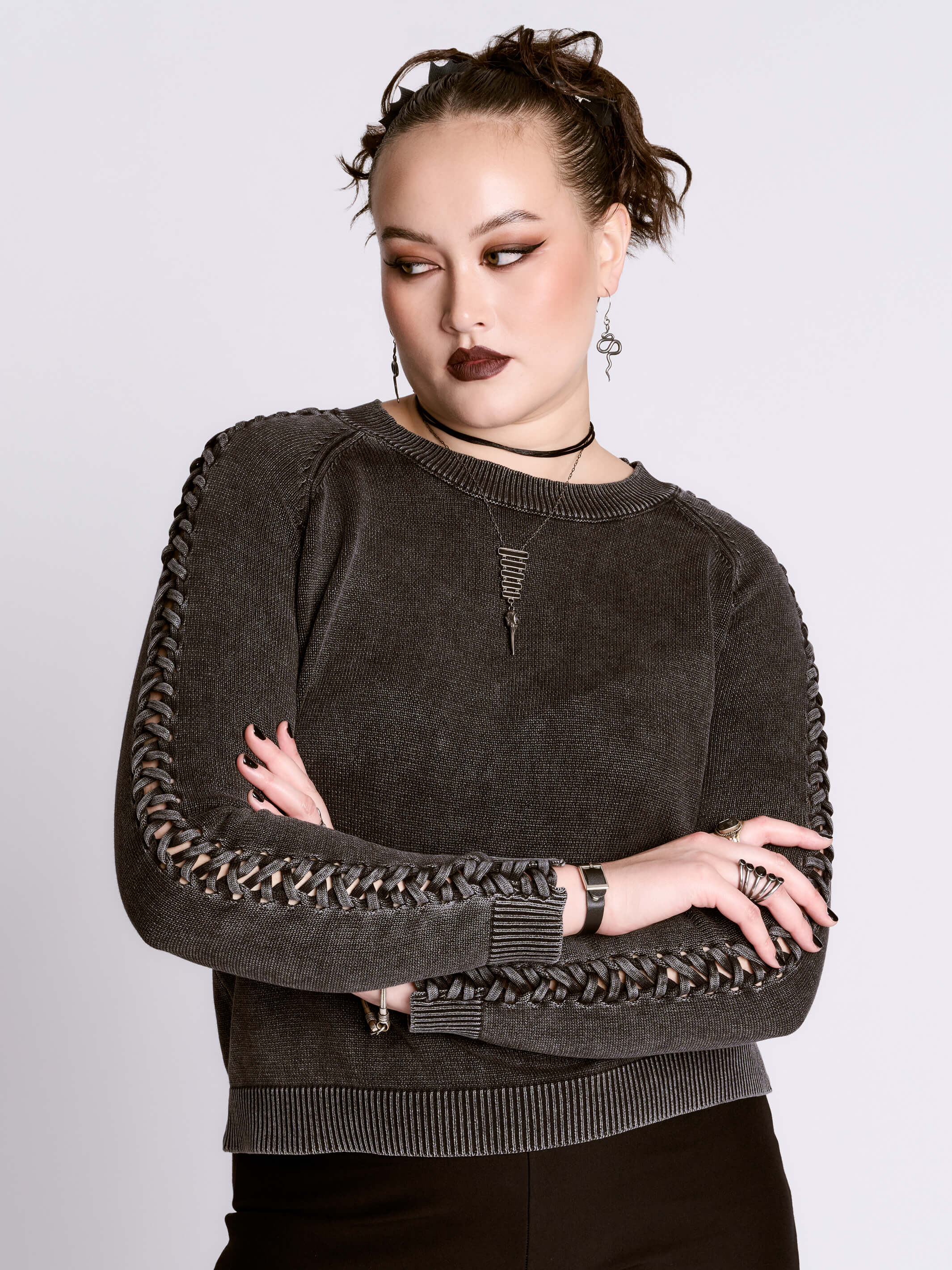 distressed braided sweater