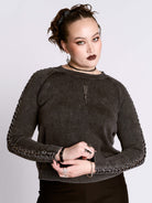 distressed braided sweater