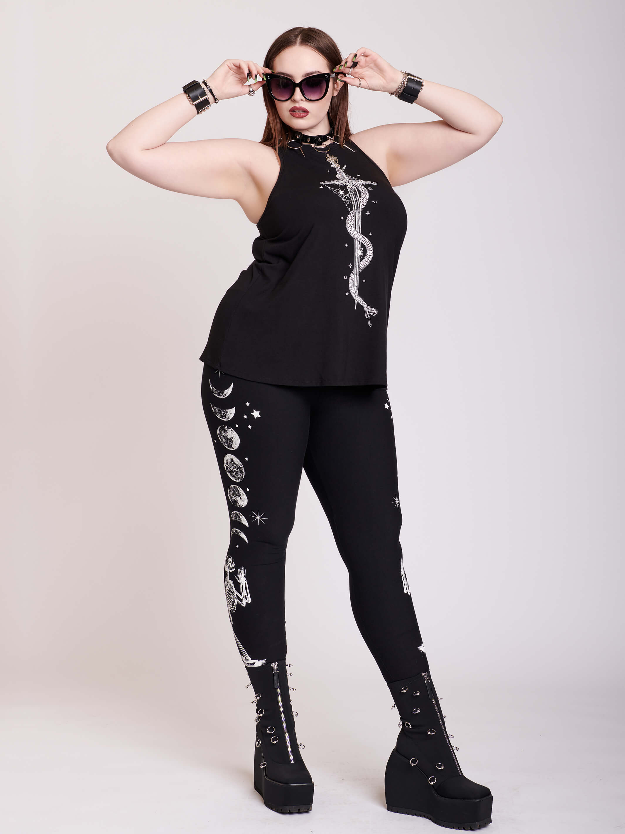 BLACK LEGGING WITH WHITE GRAPHIC FEATURING PRAYING SKELTON AND MOON PHASE